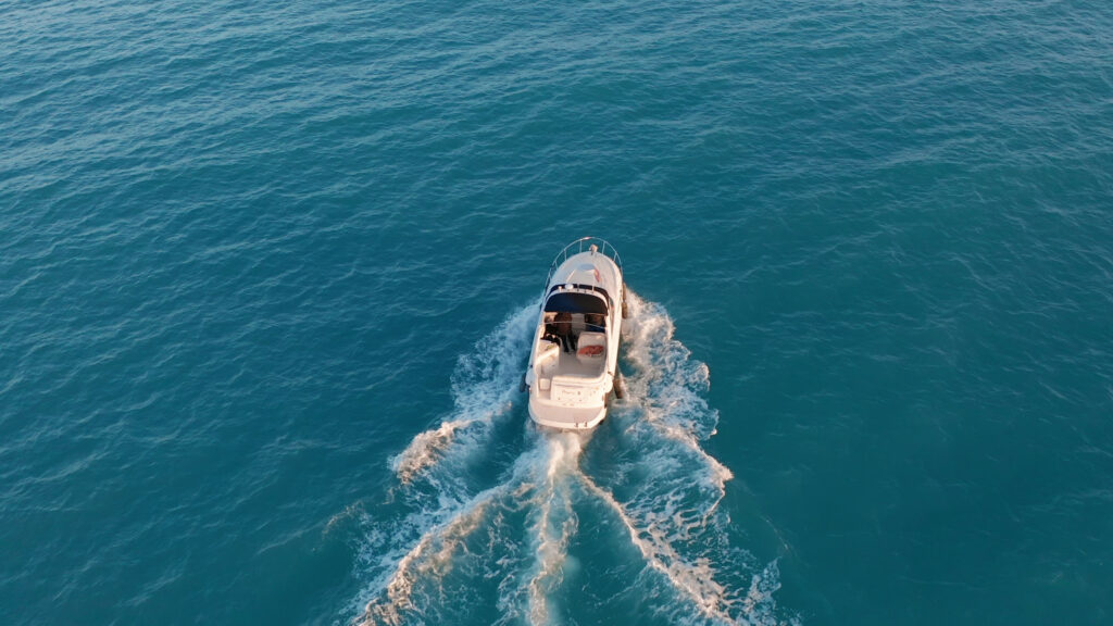 Still image of aerial view of motor boat